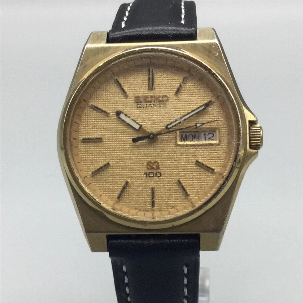 Vintage Seiko SQ 100 Mens Watch 33mm Gold Tone Day Date 6923-8010 New Battery